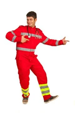 Cheerful paramedic pointing Foto stock