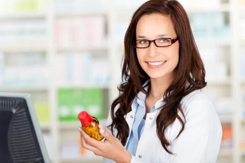 Cheerful pharmacist Stock Photos
