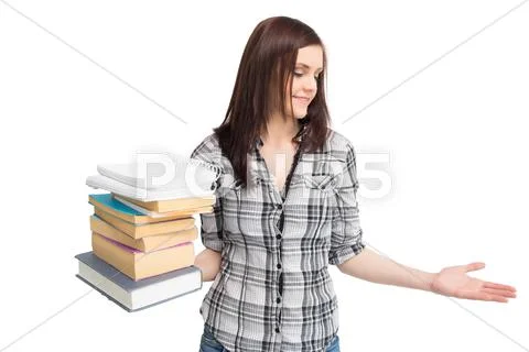 Cheerful pretty student holding pile of books Stock Photos