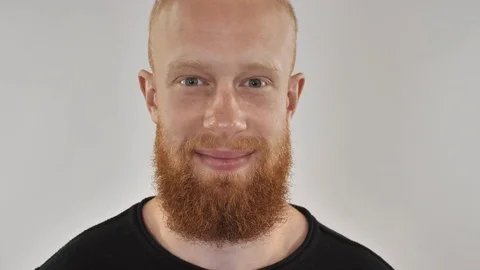 Cheerful red-haired guy smiling. portrait Stock Footage 81772735