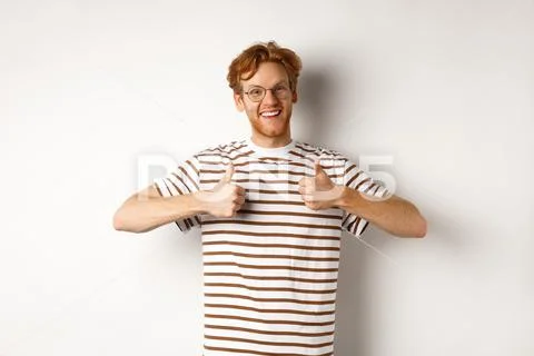 cheerful-redhead-guy-nerdy-glasses-photo-148209055_iconl.jpeg