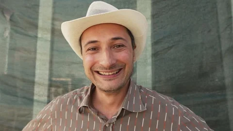 Cheerful rural man in a hat Video stock 254282729