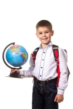 Cheerful school boy with backpack, with globe, on white background Stock Photos