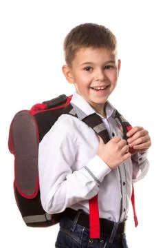 Cheerful school boy with backpack, ready to school on white background Stock Photos