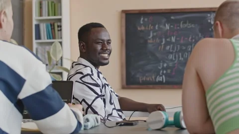 Cheerful Student Chatting with Friends on Programming Class Stock Footage 257067905
