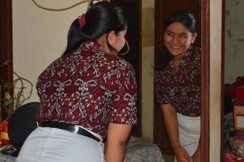 Cheerful Student Smiling Brightly At Reflection Inside Wall Mirror Stock Photos
