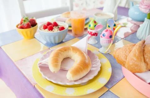 Cheerful table setting for breakfast Stock Photos