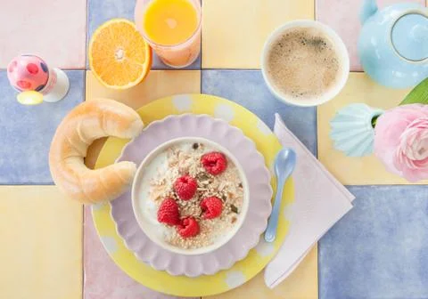 Cheerful table setting for breakfast Stock Photos