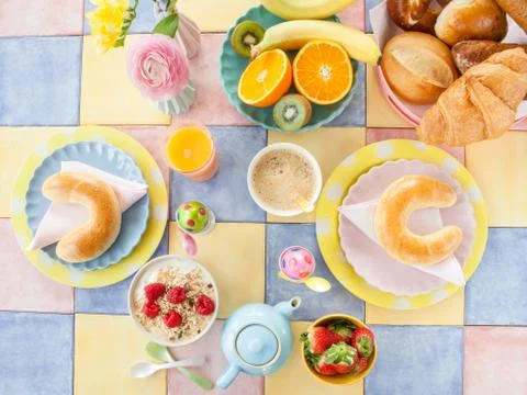 Cheerful table setting for breakfast Stock Photos