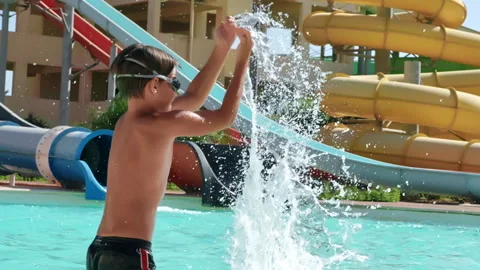 Teen Boy In The Pool Stock Footage ~ Royalty Free Stock Videos