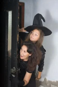 Cheerful witch Stock Photos