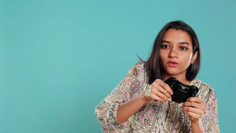 Cheerful woman playing videogames with controller Stock Footage 274995313