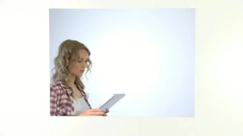 Cheerful woman using electronic tablet Stock Footage 14825716