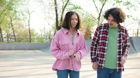 Cheerful young couple learning dance, moving emotionally for filming video blog Stock Footage 277082593