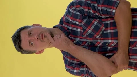 Cheerful young man finding an excellent solution of his problem Stock Footage 130178342