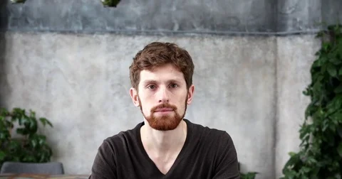 Cheerful young man smiling Stock Footage 83242764