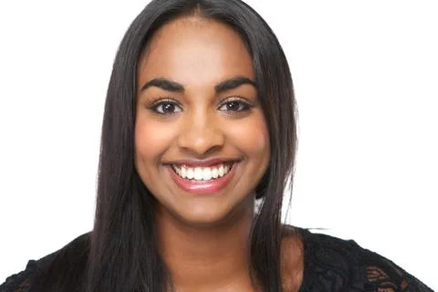 Cheerful young woman smiling on isolated white background Foto stock