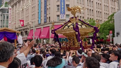 Cheering Crowd Claps as Golden Shrine Passes Historic Storefronts Stock Footage 340838283