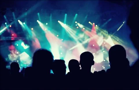 Cheering crowd in front of stage lights - retro photo 스톡 사진