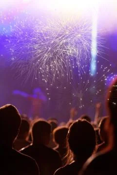 Cheering crowd in front of stage lights - retro photo Stock Photos