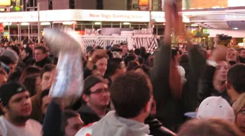 Cheering crowd in Times Square after NY Giants win 2012 Super Bowl XIV Video stock 10733912