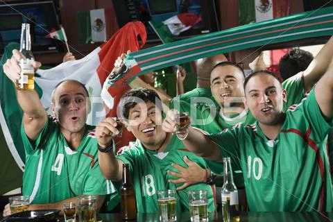 Cheering Men Drinking In Sports Bar