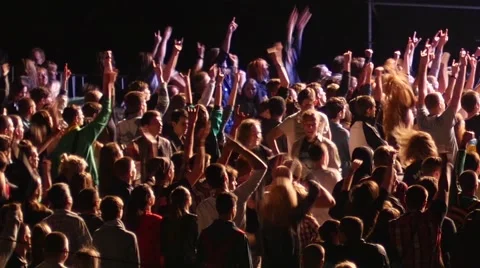 Cheering spectators audience clapping hands up in air on rock concert lumiere Stock Footage 51333053