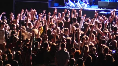 Cheering spectators audience clapping hands up in air on rock concert lumiere Stock Footage 51333113