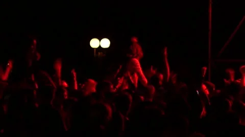 Cheering spectators audience jumping clapping hands up in air on rock concert Stock Footage 51333535
