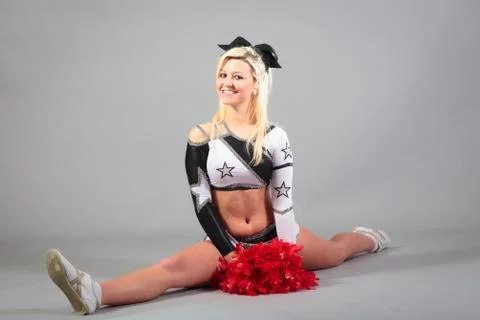 Cheerleader Doing The Splits Stock Photos