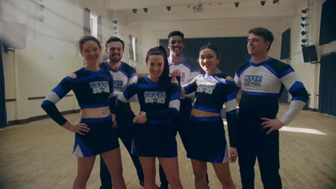Cheerleader team posing for a photo Stock Footage 279749482