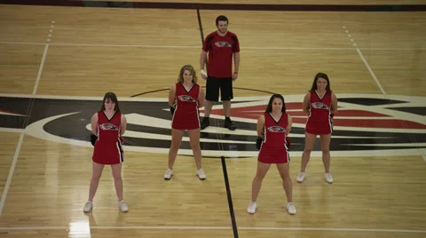 Cheerleaders Perform Dance in Empty Gym Stock Footage 35239174