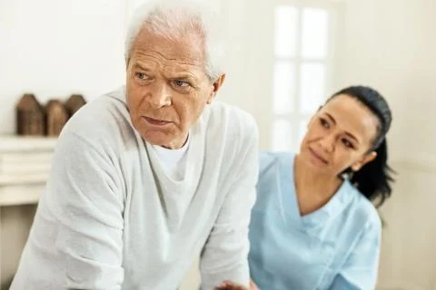 Cheerless elderly man feeling depressed Stock Photos