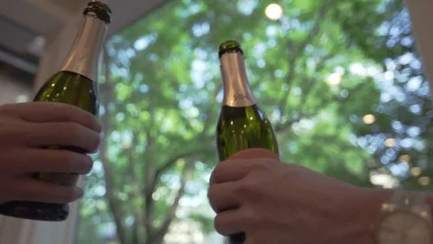 A cheers of two glasses at a party. Stock-Footage 80507861