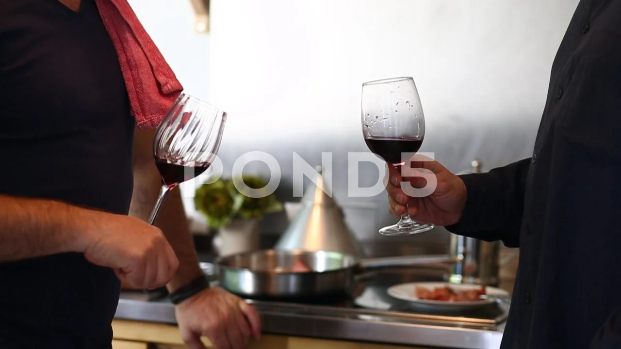 https://images.pond5.com/cheers-two-men-proposing-toast-footage-097441025_prevstill.jpeg