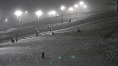 Cheery skiers sliding down in a dodging way in Levi ski resort in snowy winter Stock-Footage 123088170