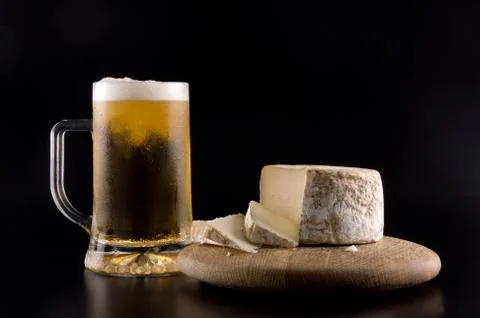 Cheese and beer Stock Photos