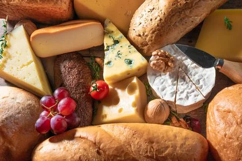 Cheese and bread background. many types of bread and cheese. cheese platter,  Stock Photos