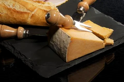 Cheese and Bread on a Slate Serving Board Stock Photos