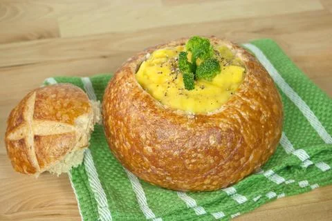 Cheese and broccoli soup in bread bowl Stock Photos