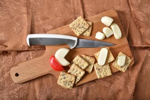 Cheese and crackers Stock Photos