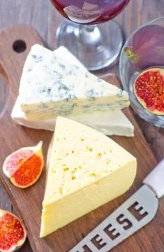 Cheese and figs Stock Photos