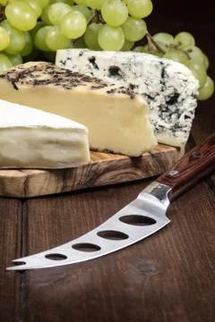 Cheese and grapes vertically 스톡 사진