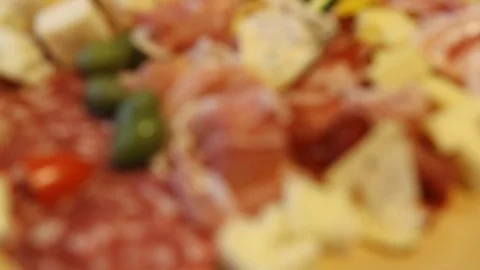 Cheese and meat appetizer selection. Stock Footage 125909829