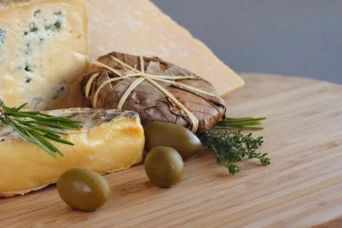 Cheese and Olives composition Stock Photos