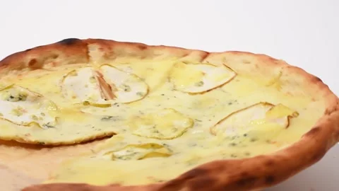 Cheese and pear pizza turning around on white background,horizontal video Stock Footage 341482053