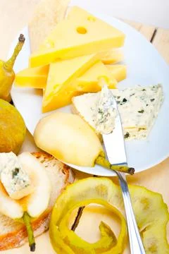 Cheese and pears Stock Photos