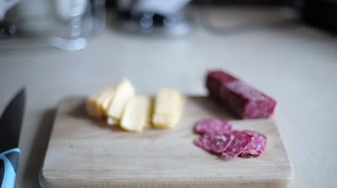 Cheese and sausage on board Stock Footage 61455450