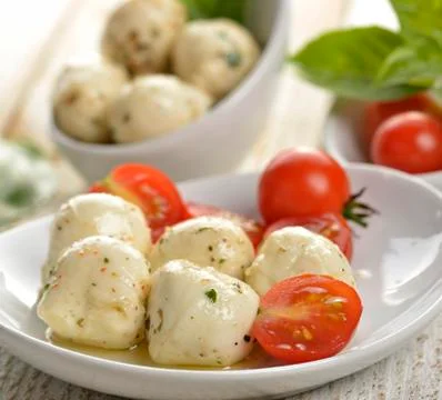 Cheese and tomatoes Stock Photos