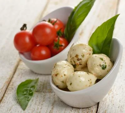 Cheese and tomatoes Stock Photos